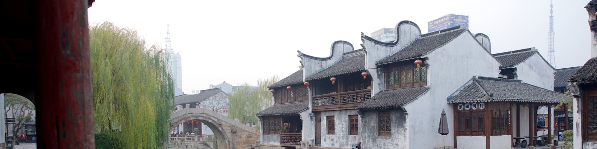 Jiaxing featuring a river or creek, heritage architecture and a small town or village