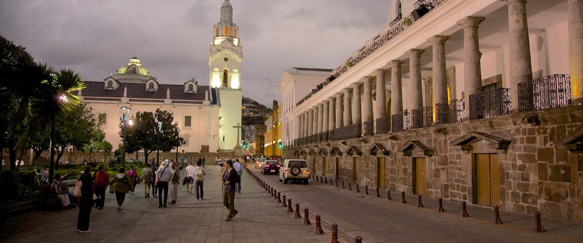Quito Cathedral showing street scenes and night scenes as well as a large group of people