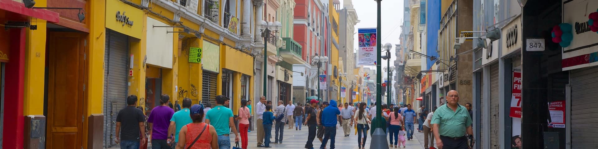 Jiron de La Union showing street scenes as well as a large group of people