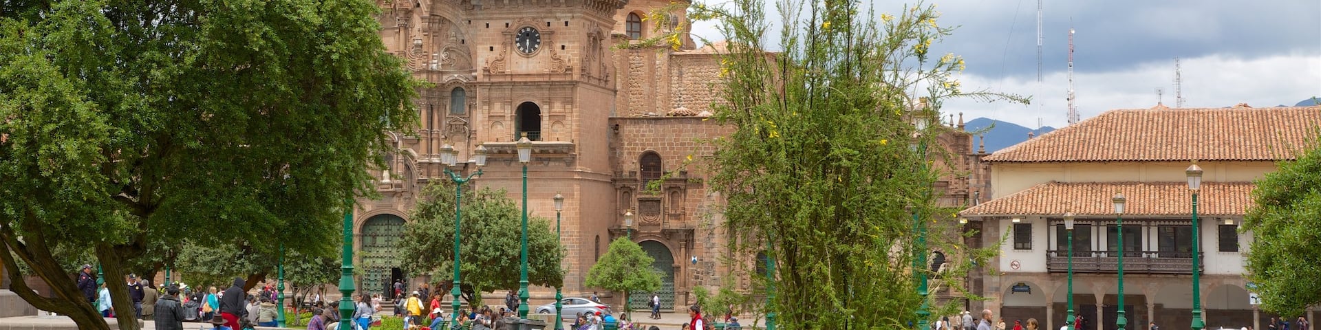 Plaza de Armas featuring a garden and a church or cathedral