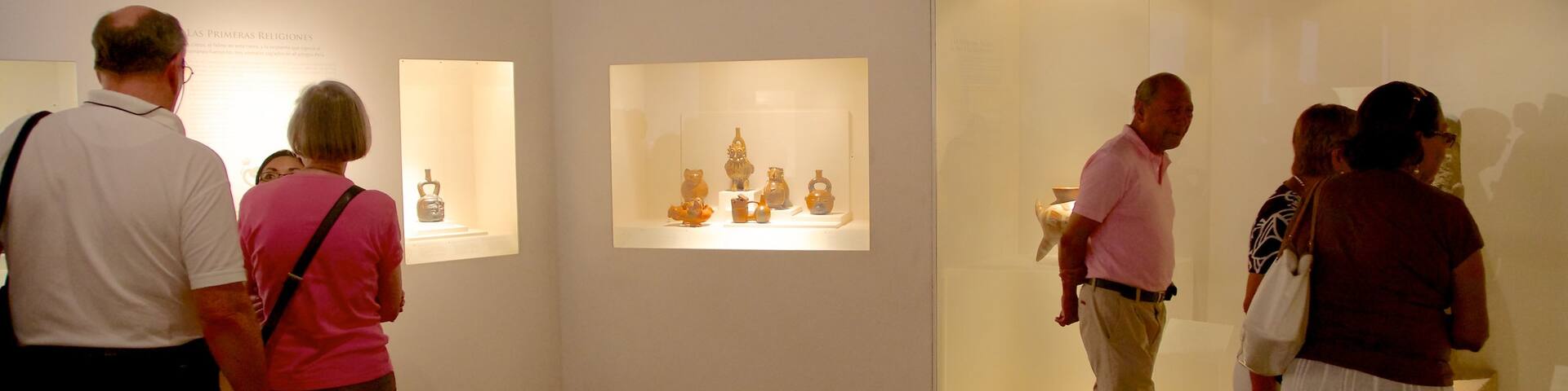 Larco Museum showing interior views as well as a large group of people