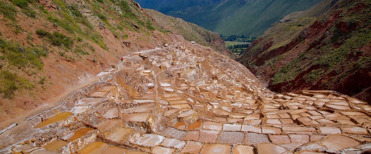Salt Mines Of Maras which includes mountains and landscape views
