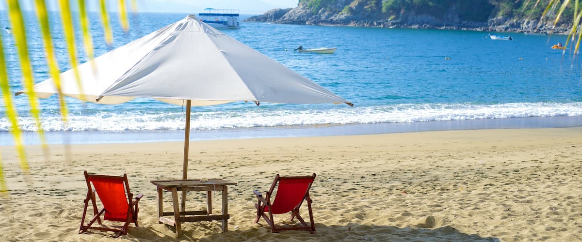 Playa La Audiencia qui includes paysages tropicaux, une plage et paysages