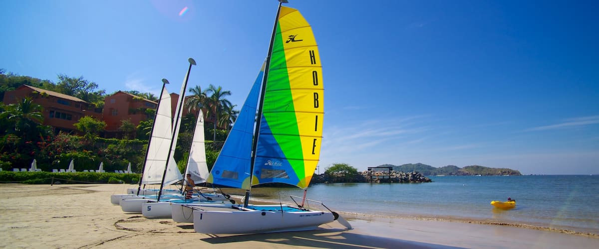 Quieta Beach showing sailing, a sandy beach and general coastal views