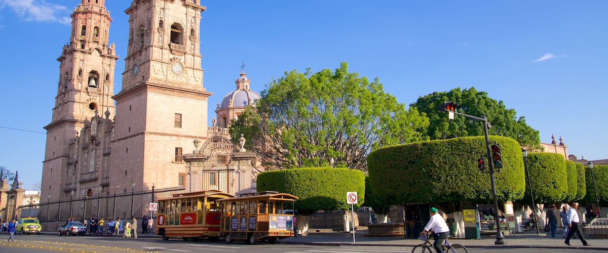 Morelia Cathedral which includes street scenes and a church or cathedral
