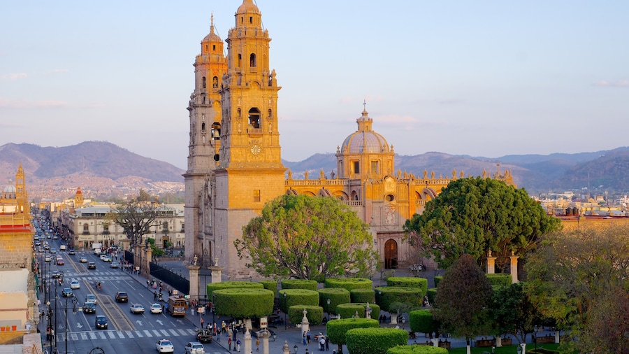 Morelia Cathedral featuring a church or cathedral and a city