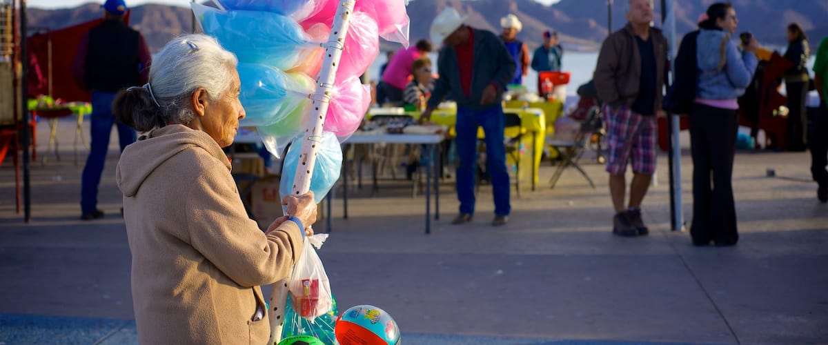 Guaymas showing street scenes as well as an individual female