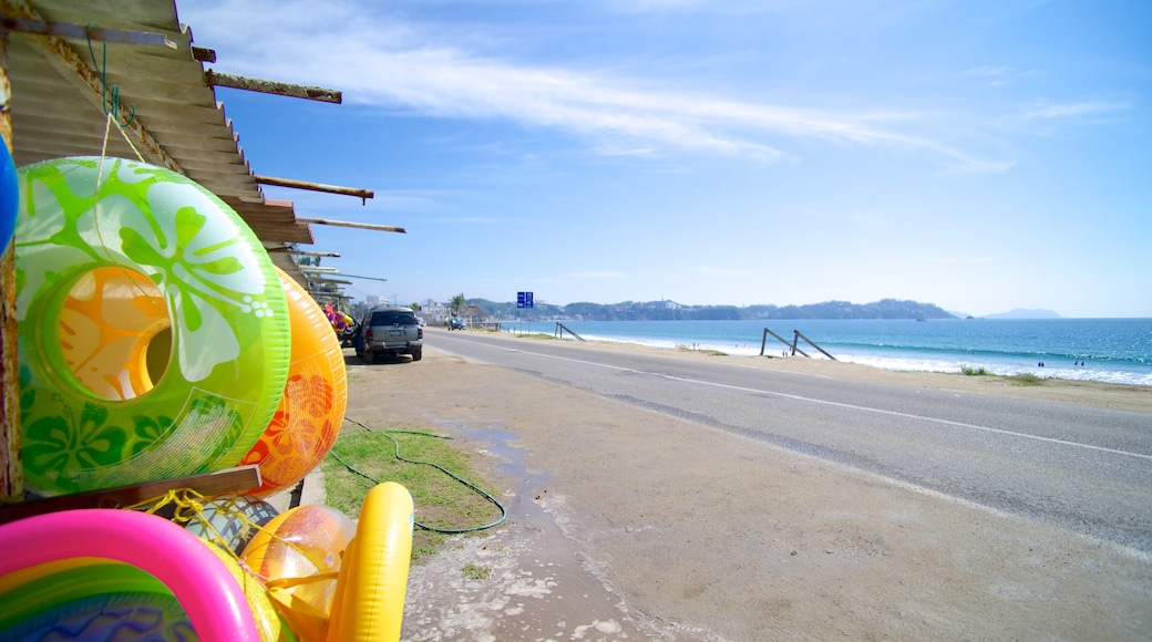 Oro Beach which includes general coastal views