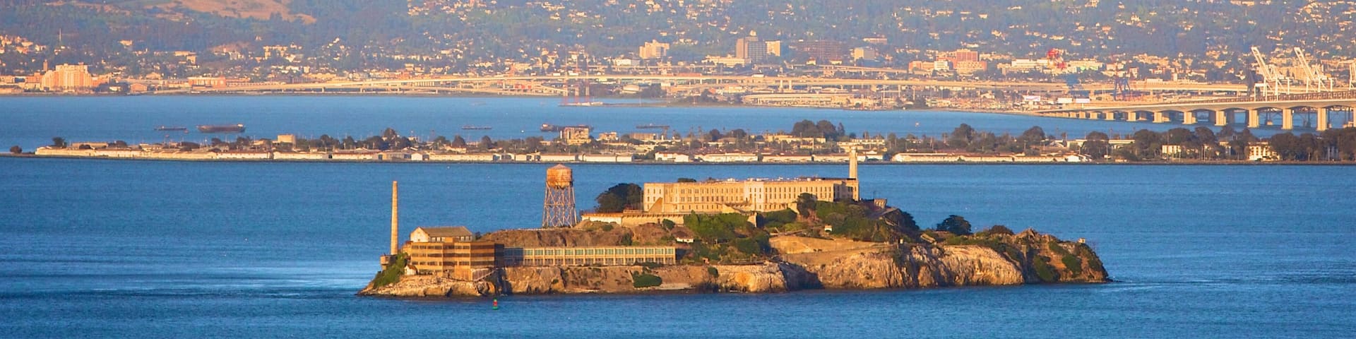 Alcatraz Island showing a coastal town and island images