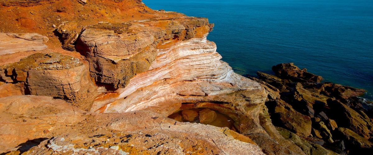 Gantheaume Point featuring landscape views and rugged coastline