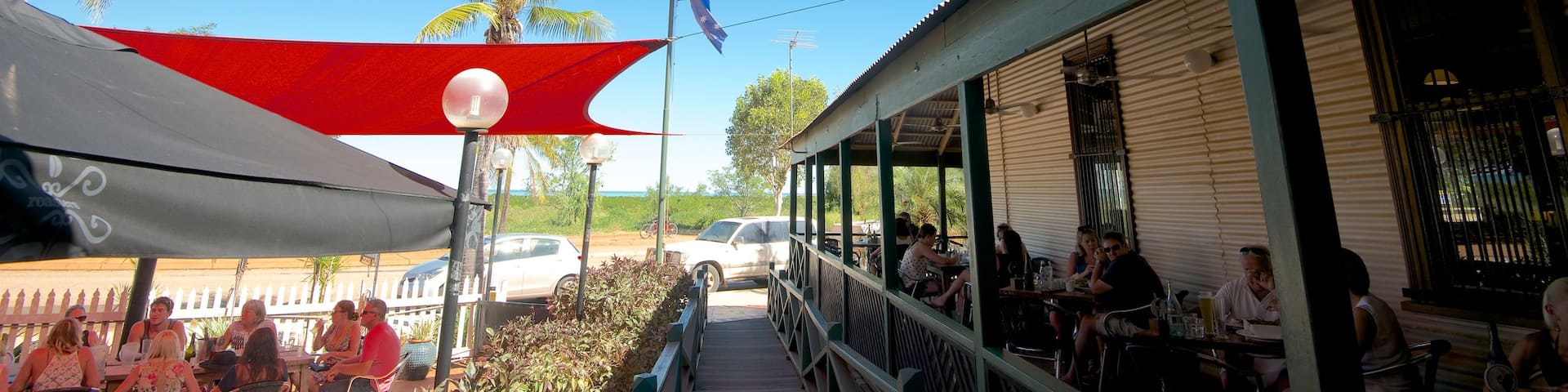 Matso\'s Brewery featuring outdoor eating as well as a large group of people