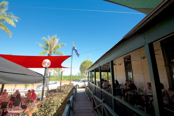 Matso\'s Brewery featuring outdoor eating as well as a large group of people