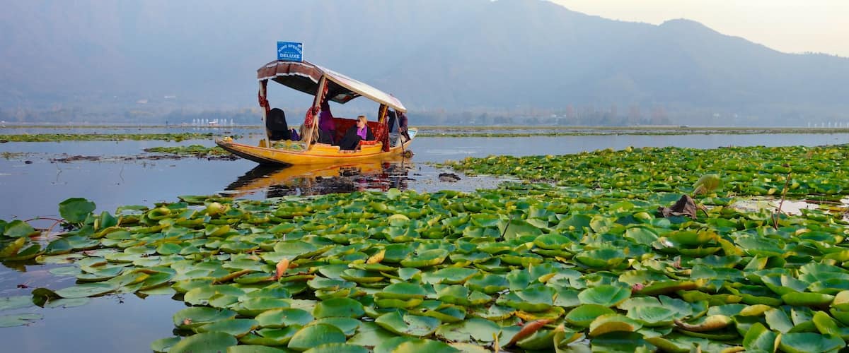 Jammu and Kashmir featuring a lake or waterhole, boating and landscape views
