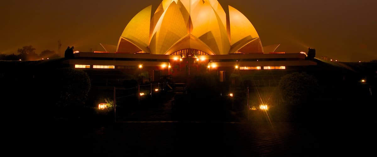 Lotus Temple which includes night scenes and modern architecture