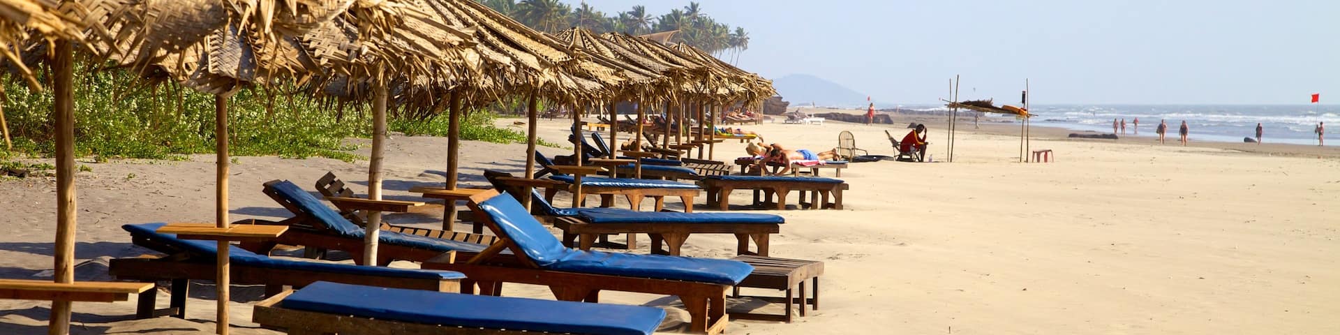 Ashvem Beach showing a sandy beach, tropical scenes and landscape views
