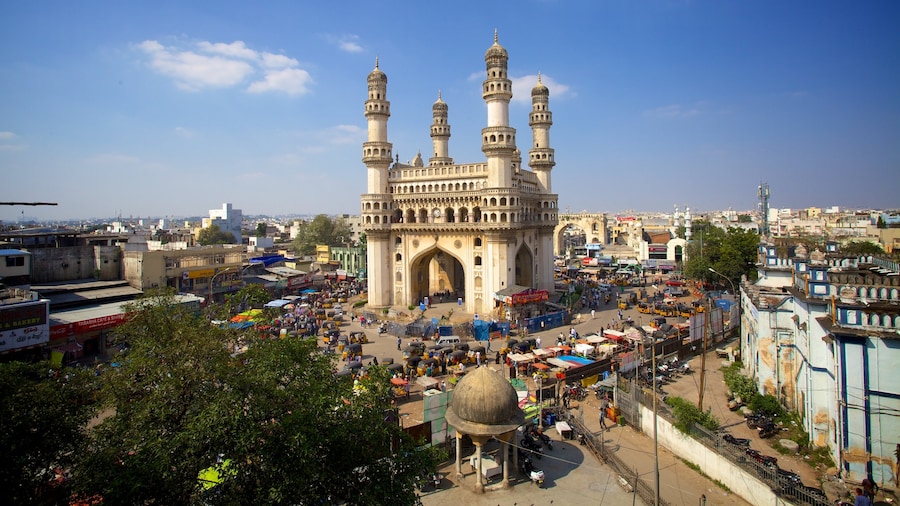 Charminar which includes a square or plaza, a monument and a city