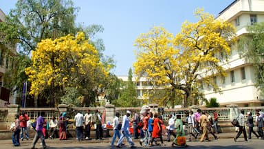 Pune showing street scenes and a city as well as a large group of people