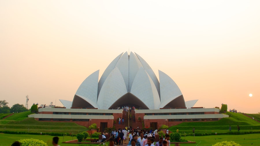 Lotus Temple which includes a temple or place of worship, religious aspects and a sunset