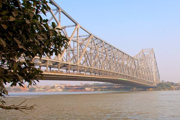 Howrah Bridge which includes a bridge and a river or creek