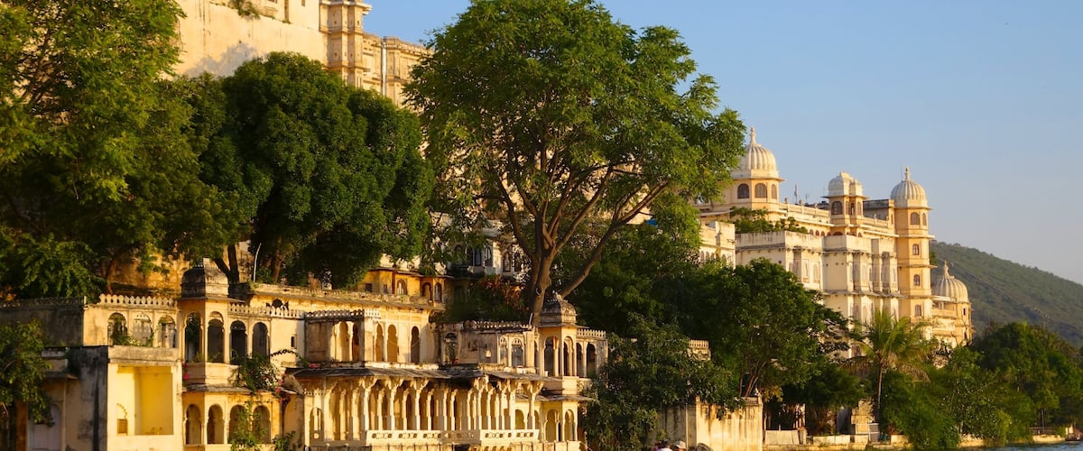 City Palace showing a lake or waterhole and a castle