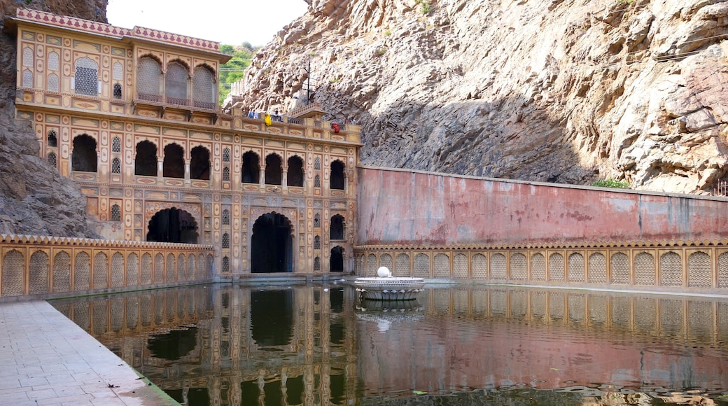 Galta-Monkey Palace featuring a pond, château or palace and heritage architecture