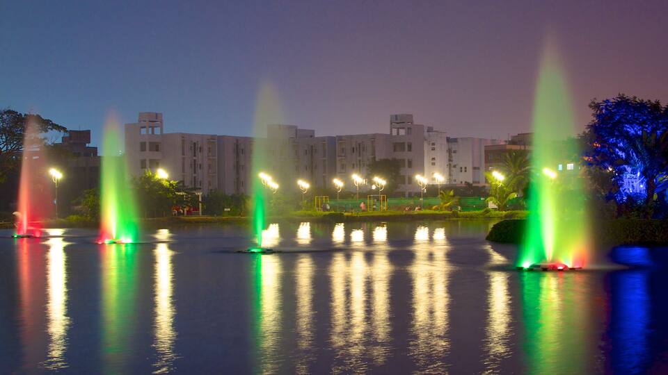 Kolkata showing night scenes, a lake or waterhole and a fountain