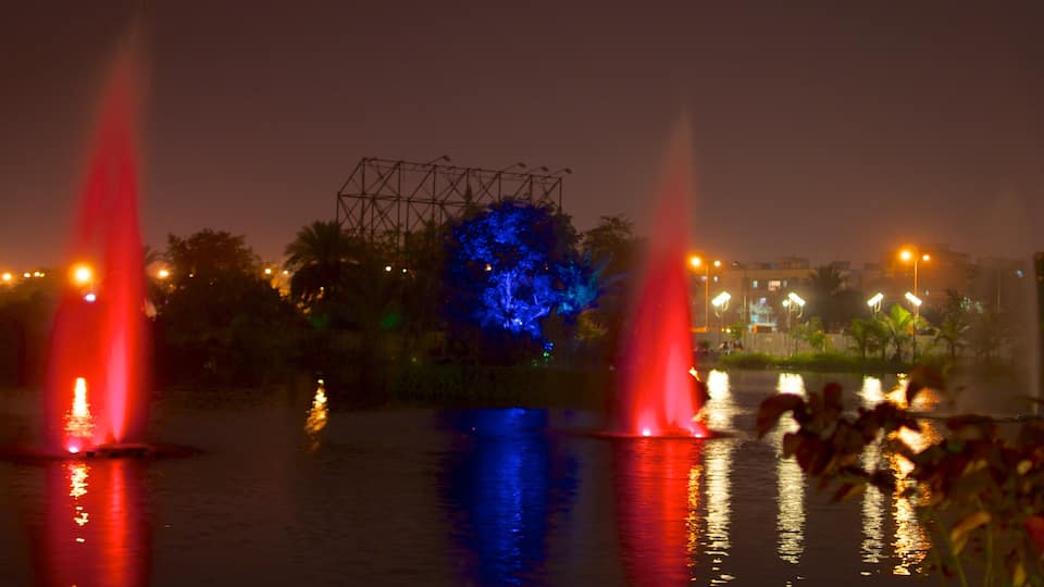 Kolkata featuring a lake or waterhole, a city and night scenes
