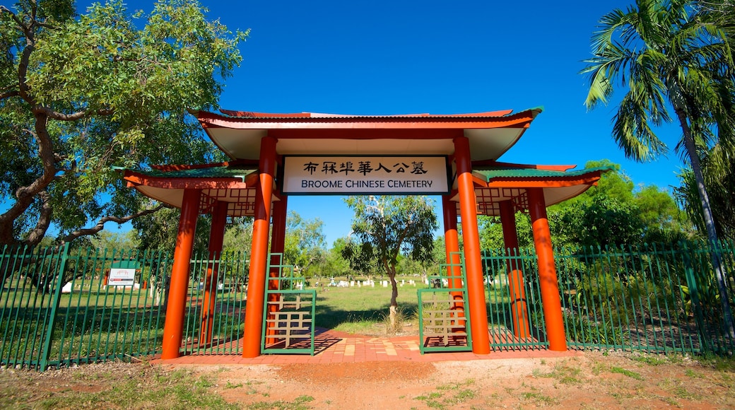 Broome featuring a cemetery and signage