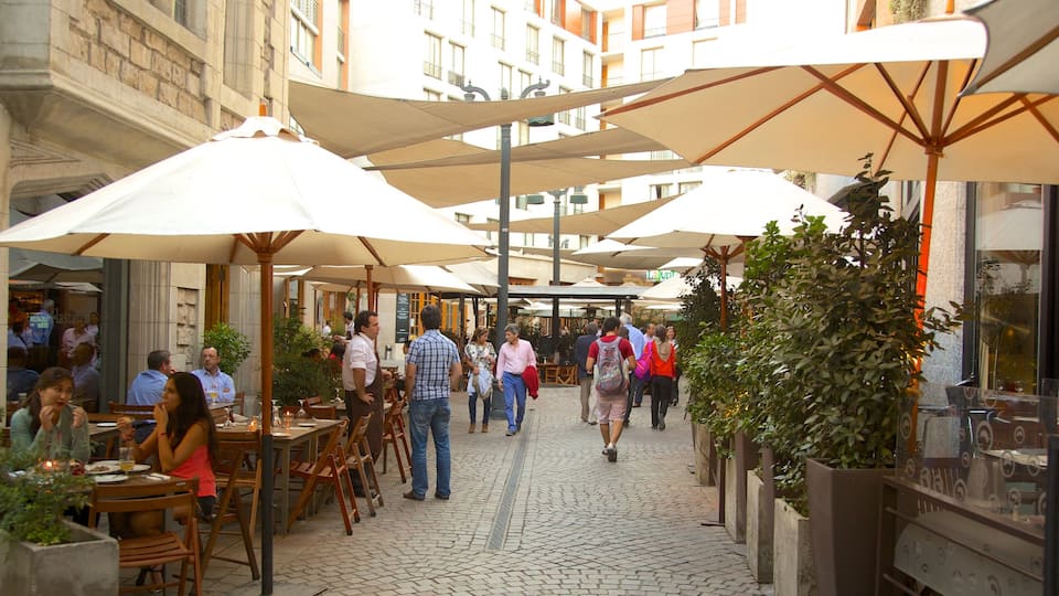 Lastarria which includes cafe lifestyle and street scenes as well as a large group of people