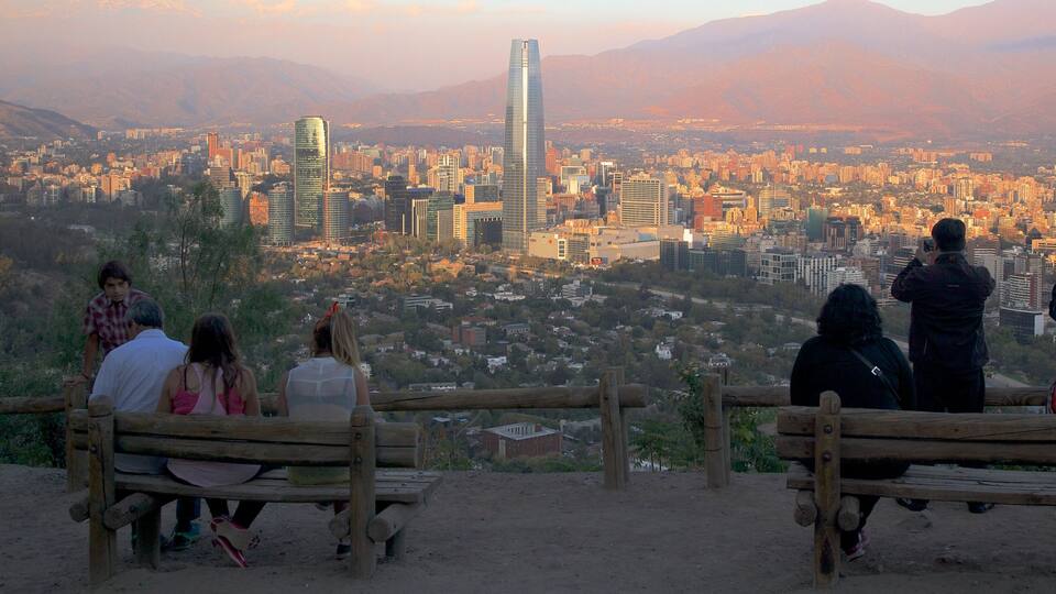 San Cristobal Hill showing views, a sunset and skyline