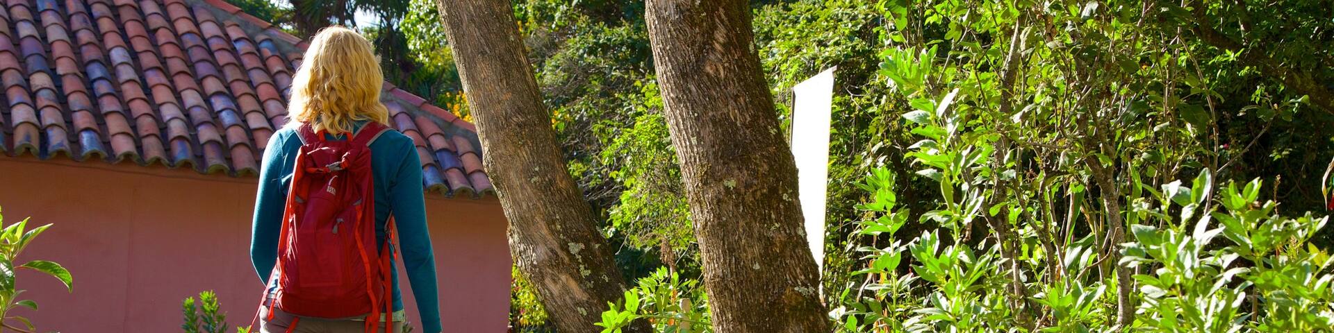Casa Museo Quinta de Bolivar showing hiking or walking as well as an individual femail