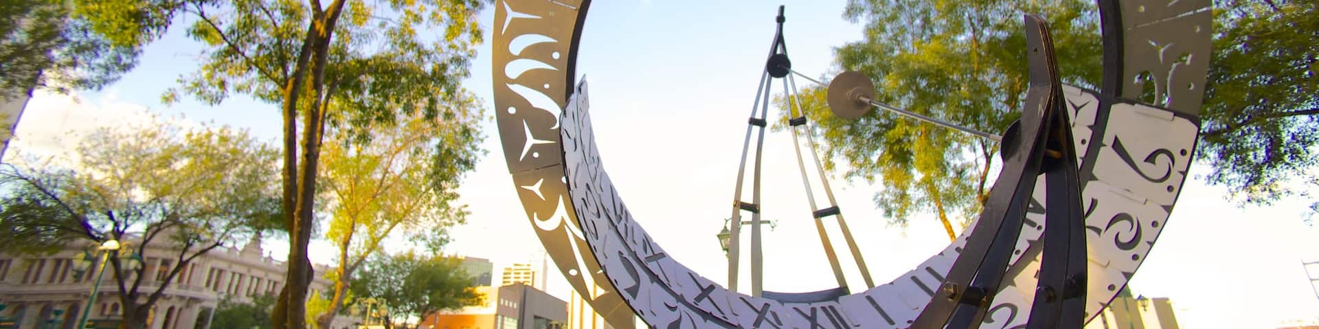 Plaza Zaragoza featuring a garden and outdoor art