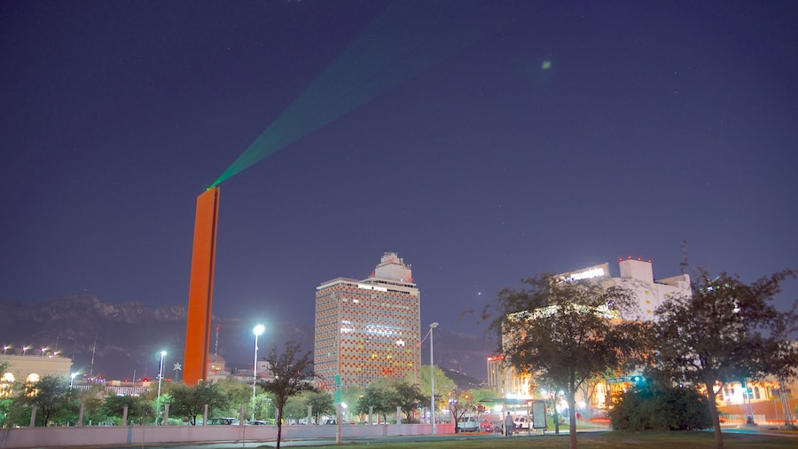 Faro de Comercio which includes modern architecture, a monument and a city