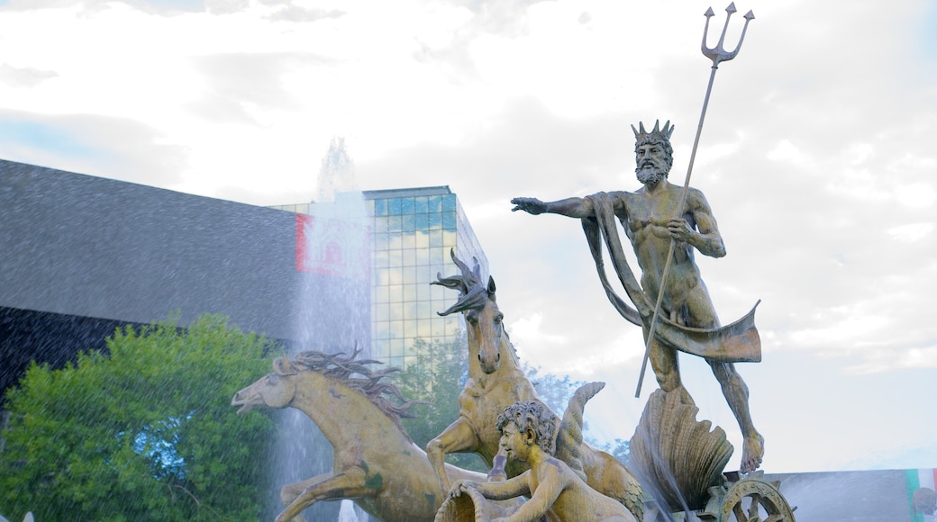 Fuente de la Vida o Neptuno showing a monument