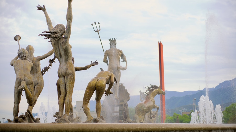 Fuente de la Vida o Neptuno which includes a statue or sculpture, a city and art