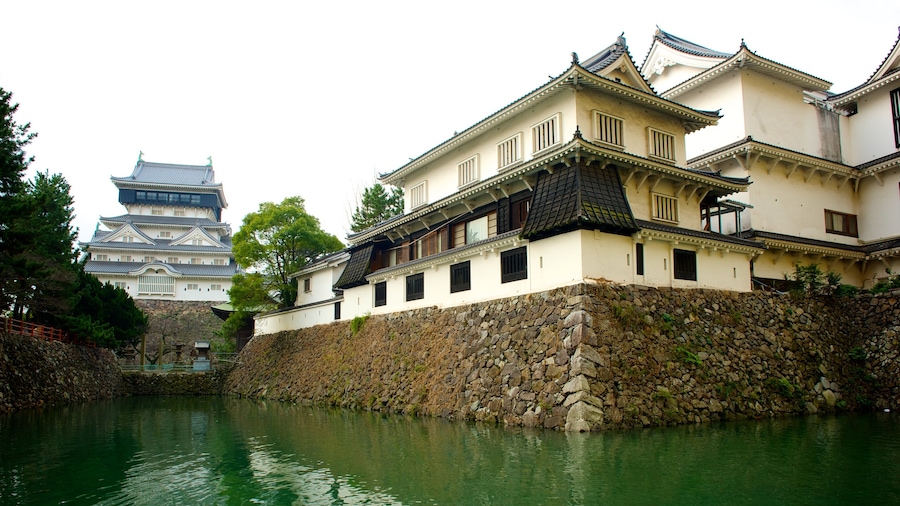 Castillo de Kokura ofreciendo patrimonio de arquitectura, castillo o palacio y un estanque