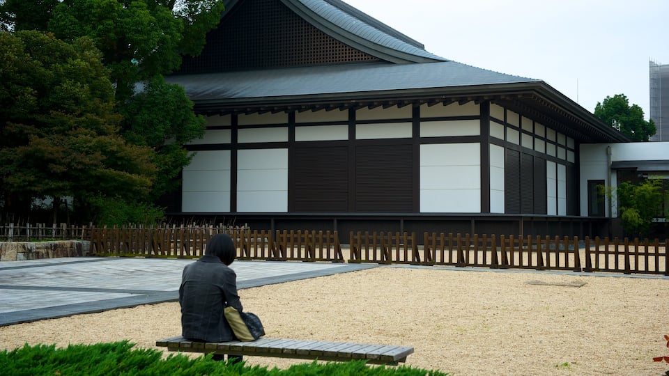 Nagoya City Art Museum as well as an individual female
