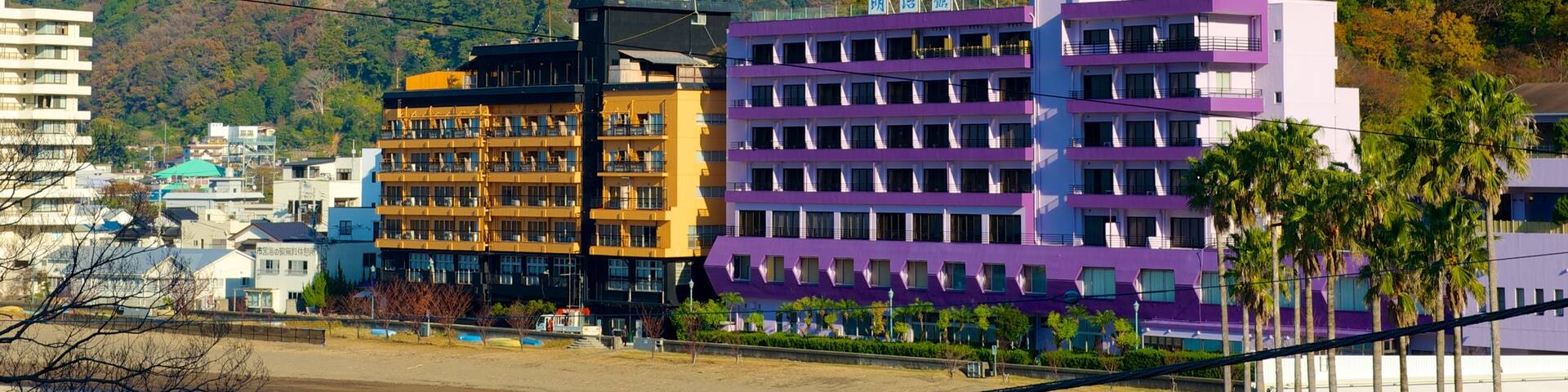 Toi Beach which includes a hotel, mountains and a beach