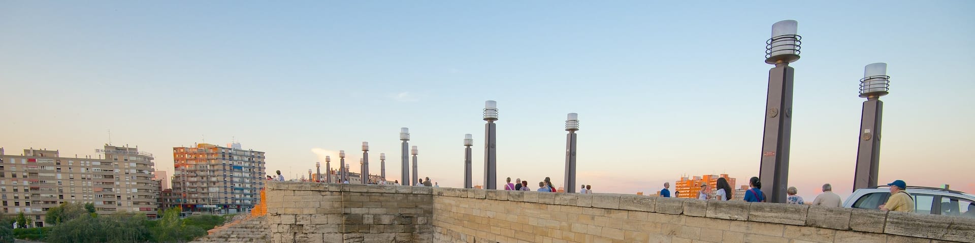 Puente de Piedra featuring a city, a bridge and a river or creek