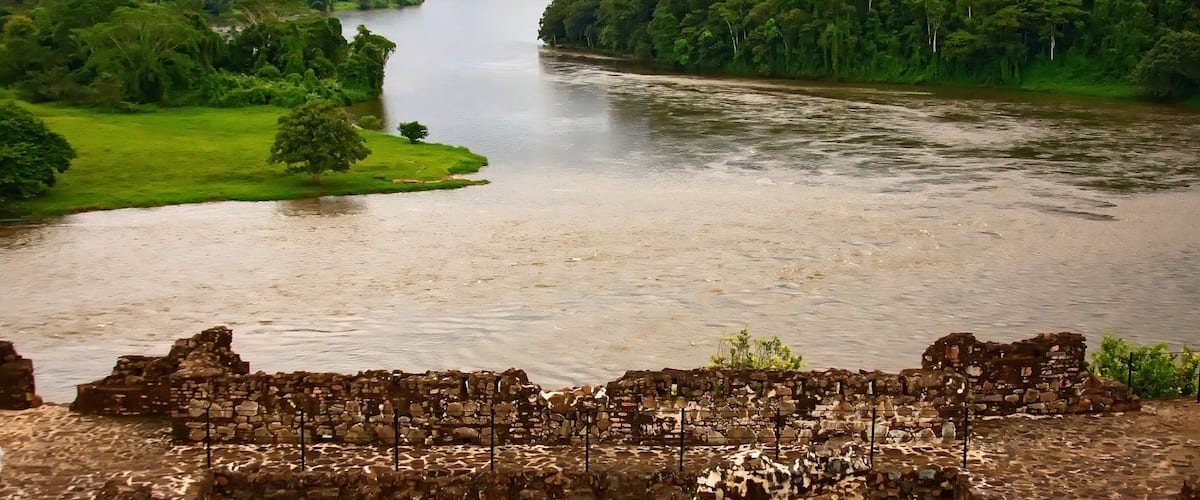 Rio San Juan which includes forest scenes and a river or creek