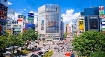 Shibuya showing a high rise building, street scenes and modern architecture