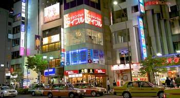 Roppongi which includes a city, street scenes and signage