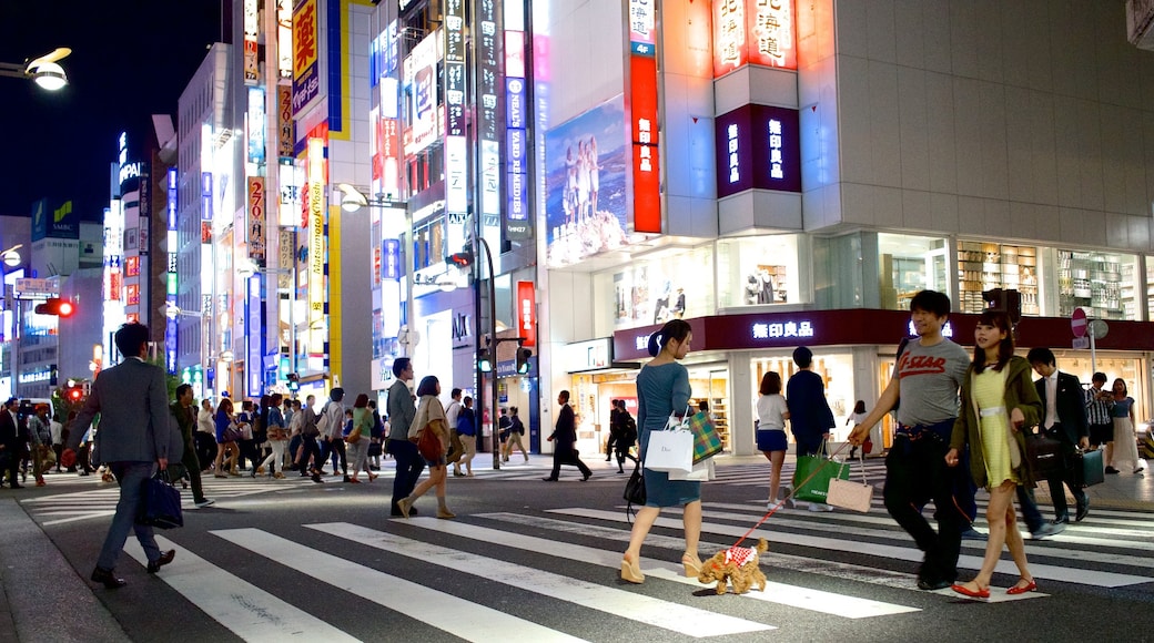 Harajuku showing street scenes, a city and signage