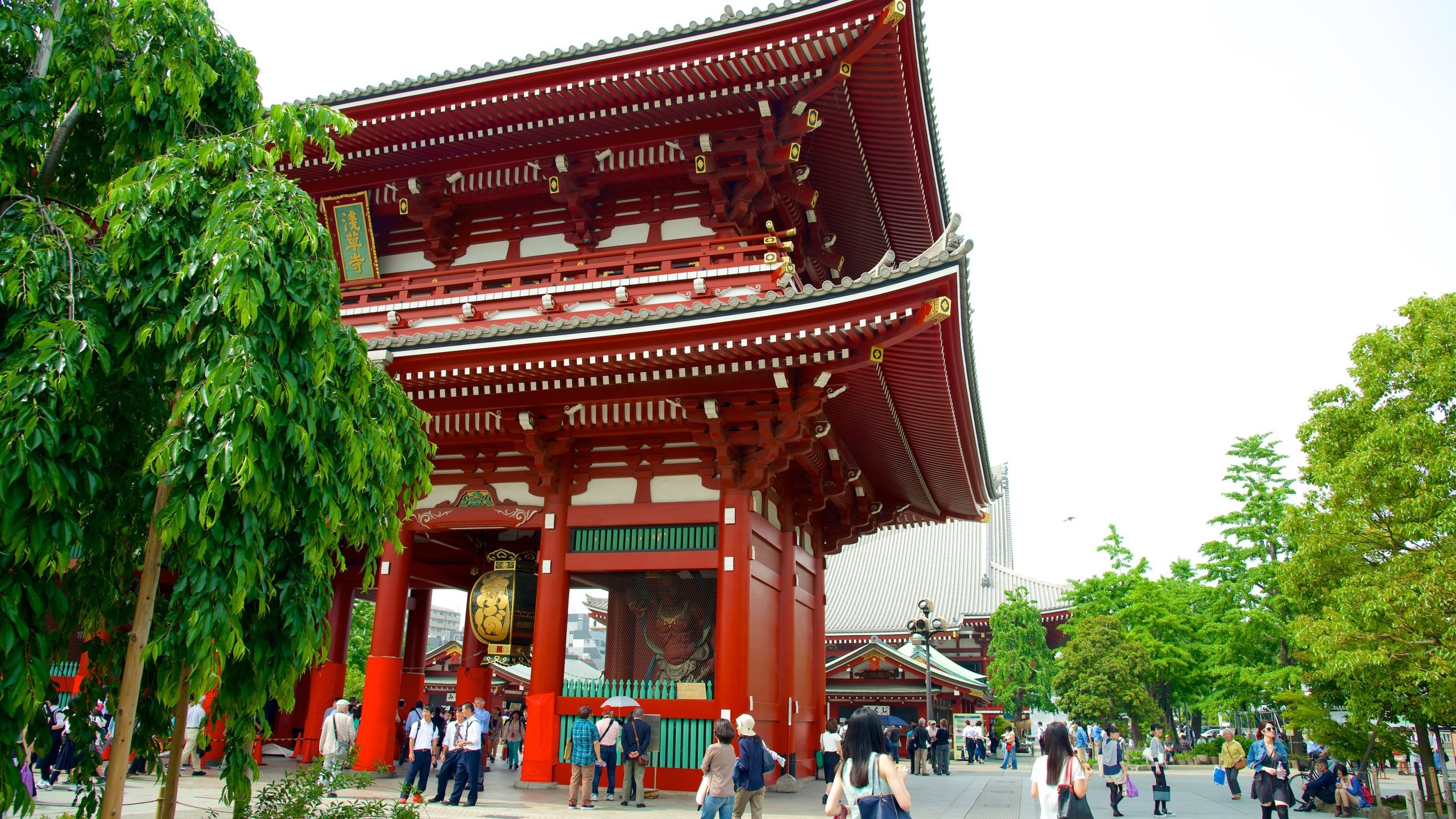 Sensoji Temple which includes street scenes, a temple or place of worship and religious elements