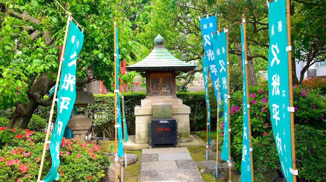 Sensoji Temple featuring religious elements, signage and a temple or place of worship