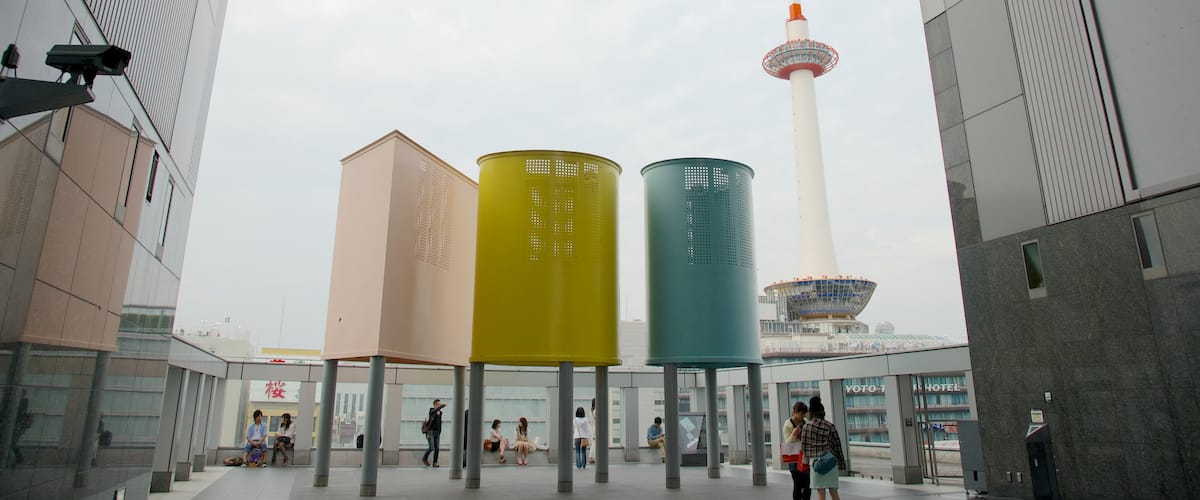 Kyoto Tower featuring a skyscraper, modern architecture and a city