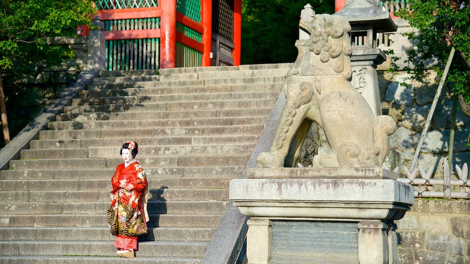Kiyomizu Temple which includes a temple or place of worship, a city and religious elements