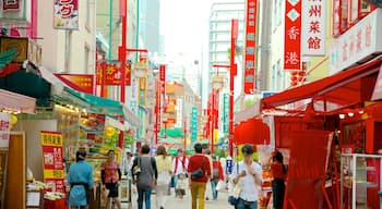 Chinatown welches beinhaltet Märkte, Stadt und Beschilderung