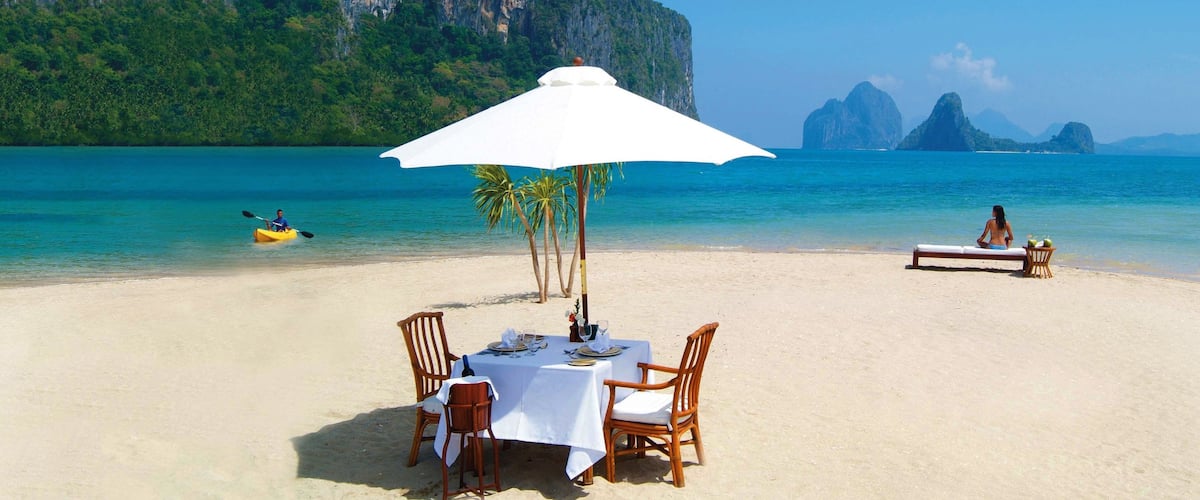 Palawan showing kayaking or canoeing, a luxury hotel or resort and landscape views