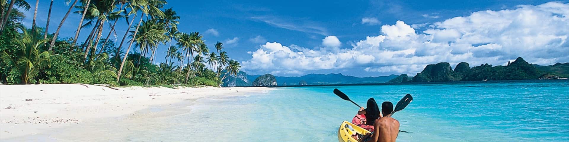 Palawan showing tropical scenes, a sandy beach and landscape views